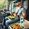 A truck driver enjoying a healthy meal in his cab—grilled chicken, salad, and water. Eating smart on the road!